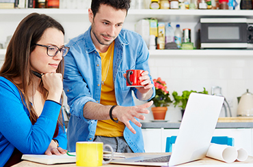 couple looking at laptop