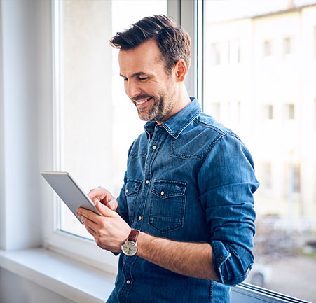 man looking at laptop man on laptop