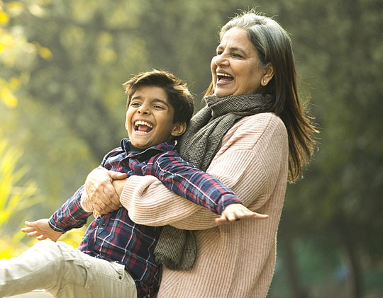 Happy smiling lady with grandson