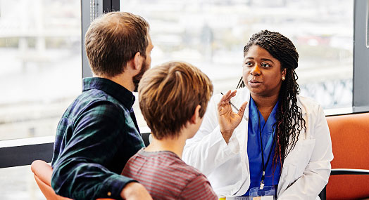 A couple consulting with a doctor