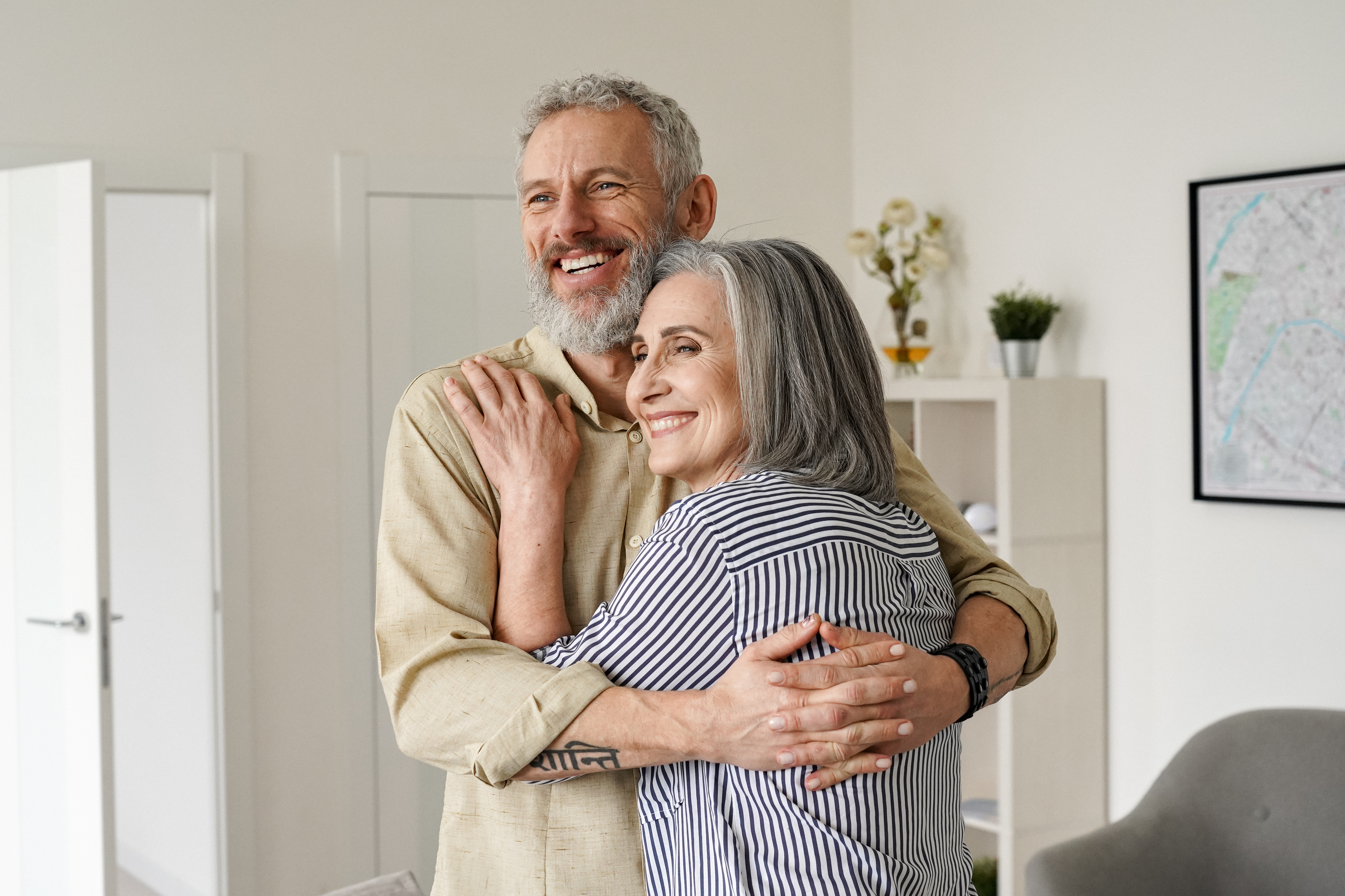 elderly couple cuddling