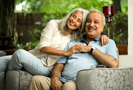 elderly couple smiling
