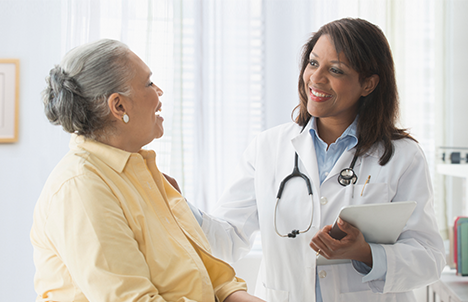 Female Doctor with Female Patient in Office