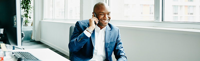 Business Man on Phone In Office