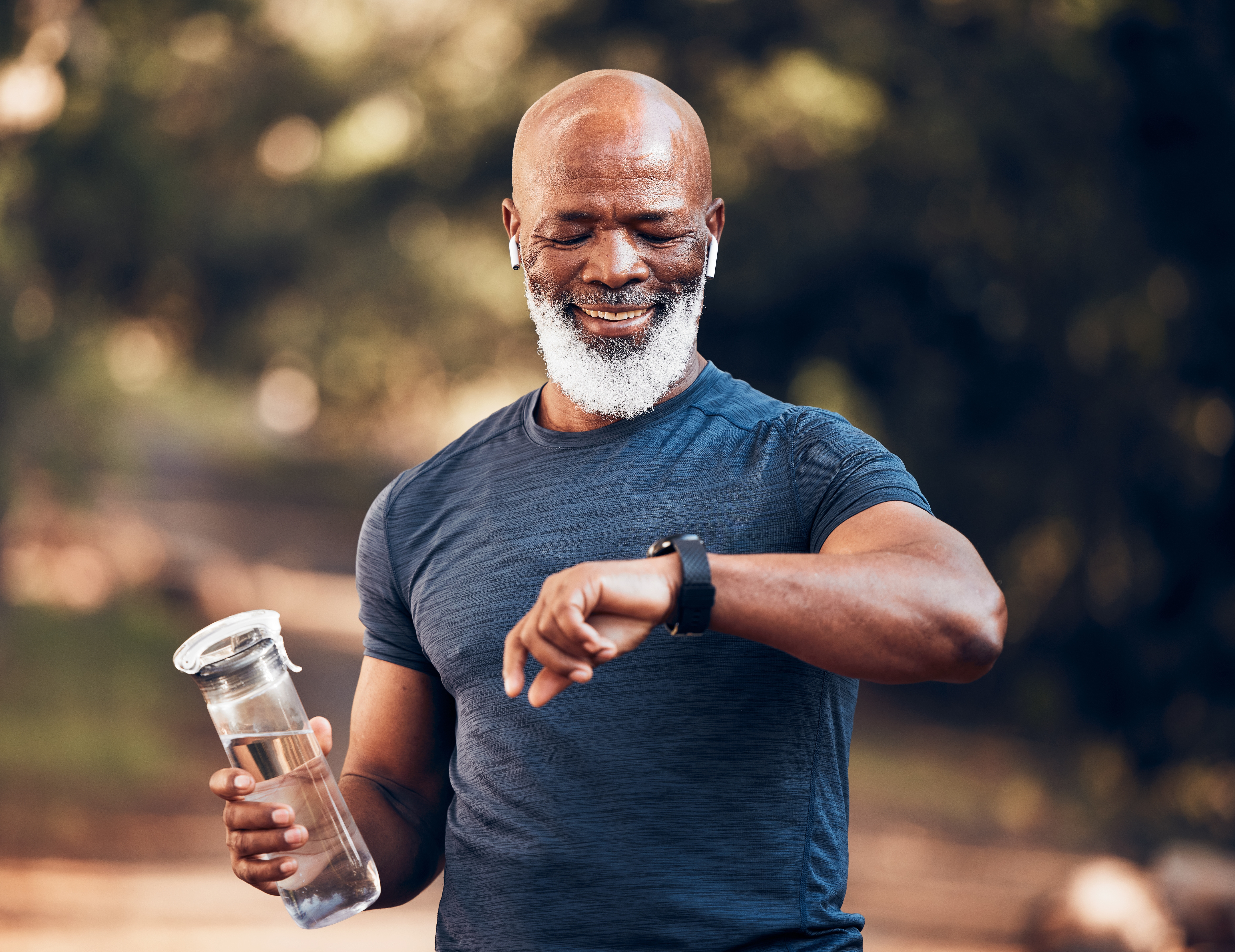Man jogging outdoors in a park setting