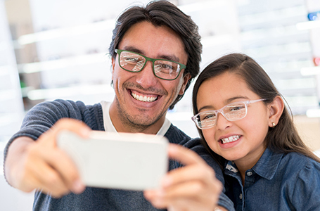 father daughter taking selfie